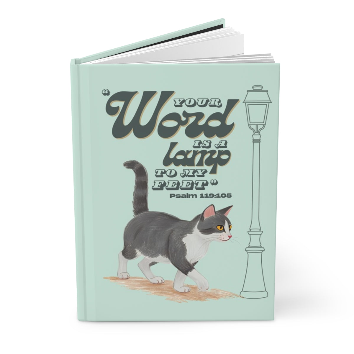 Notebook with a cat illustration and text on a light green background