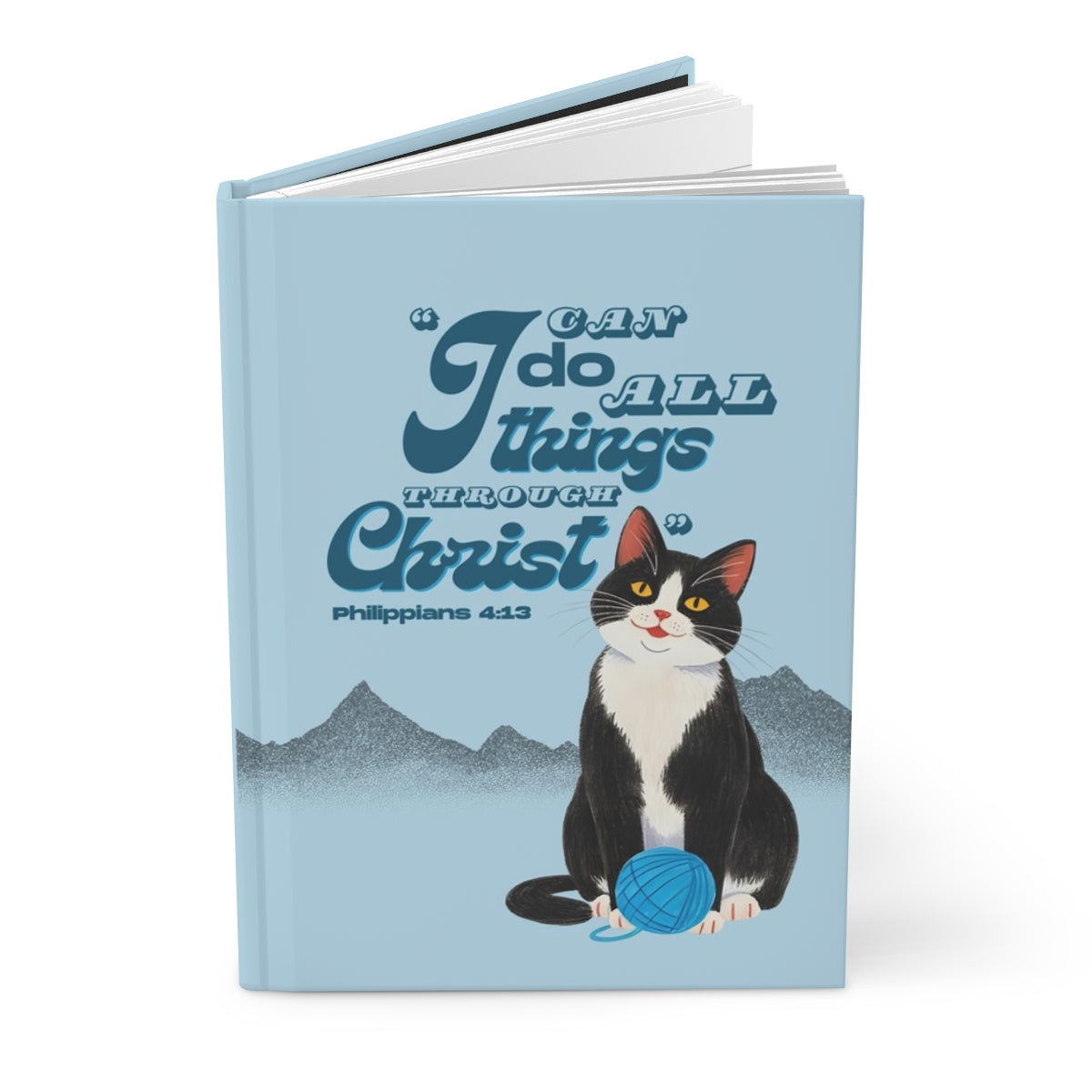 Notebook with a cat illustration and text on a light blue background