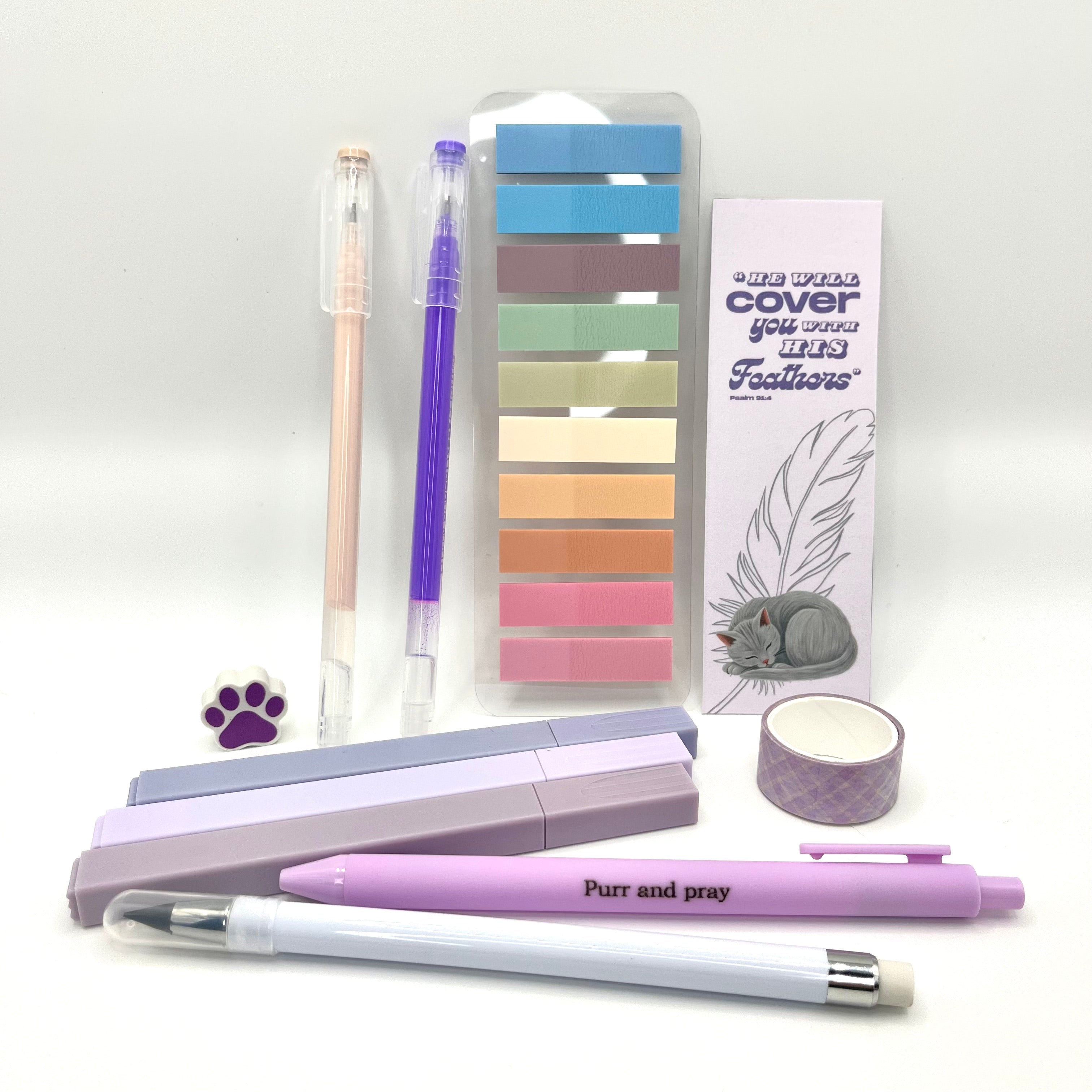 Christian stationery set including highlighters, gel pens, everlasting pencil, sticky notes, washi tape, bookmark, and eraser arranged neatly in lavender color palette.