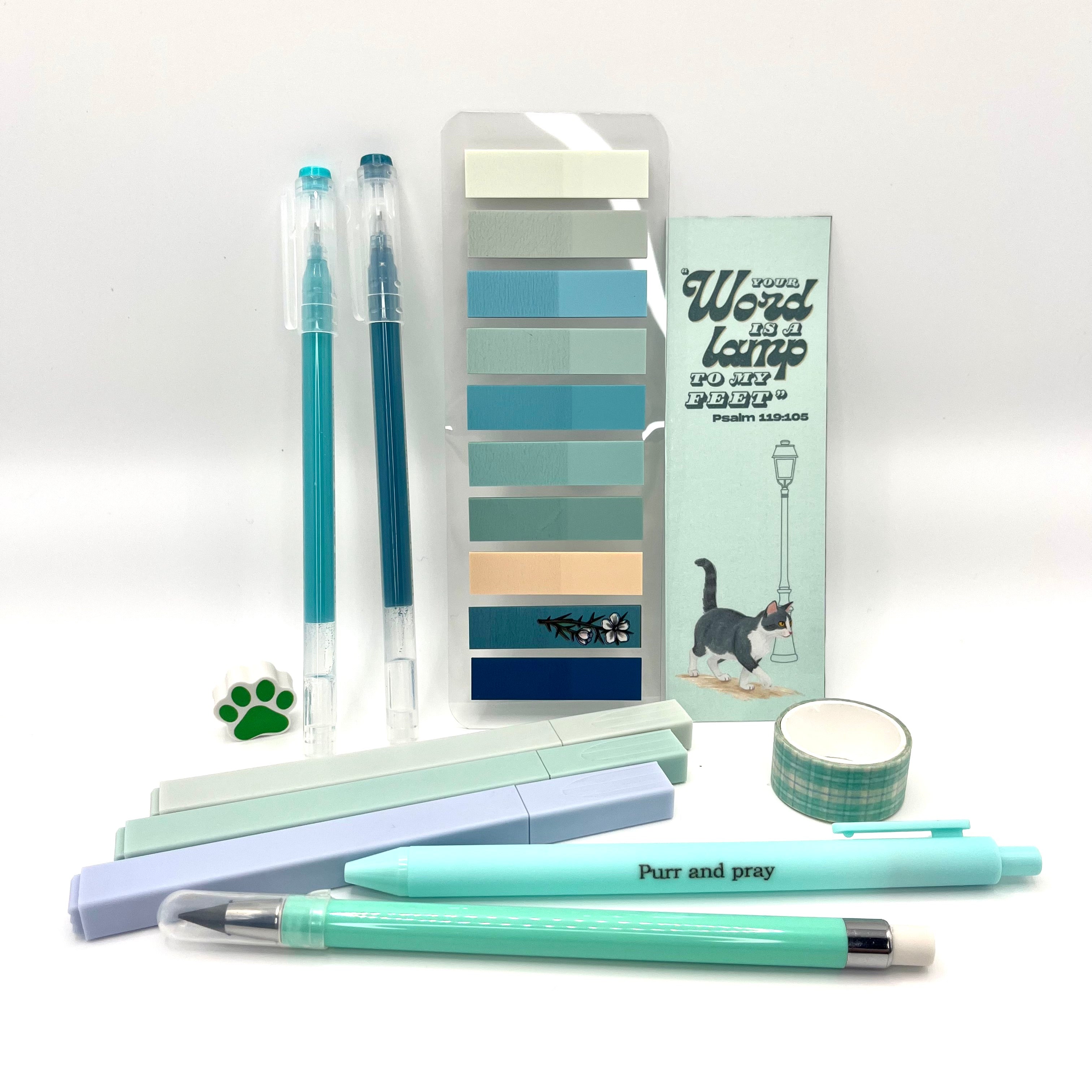 Christian stationery set including highlighters, gel pens, everlasting pencil, sticky notes, washi tape, bookmark, and eraser arranged neatly in mint color palette.