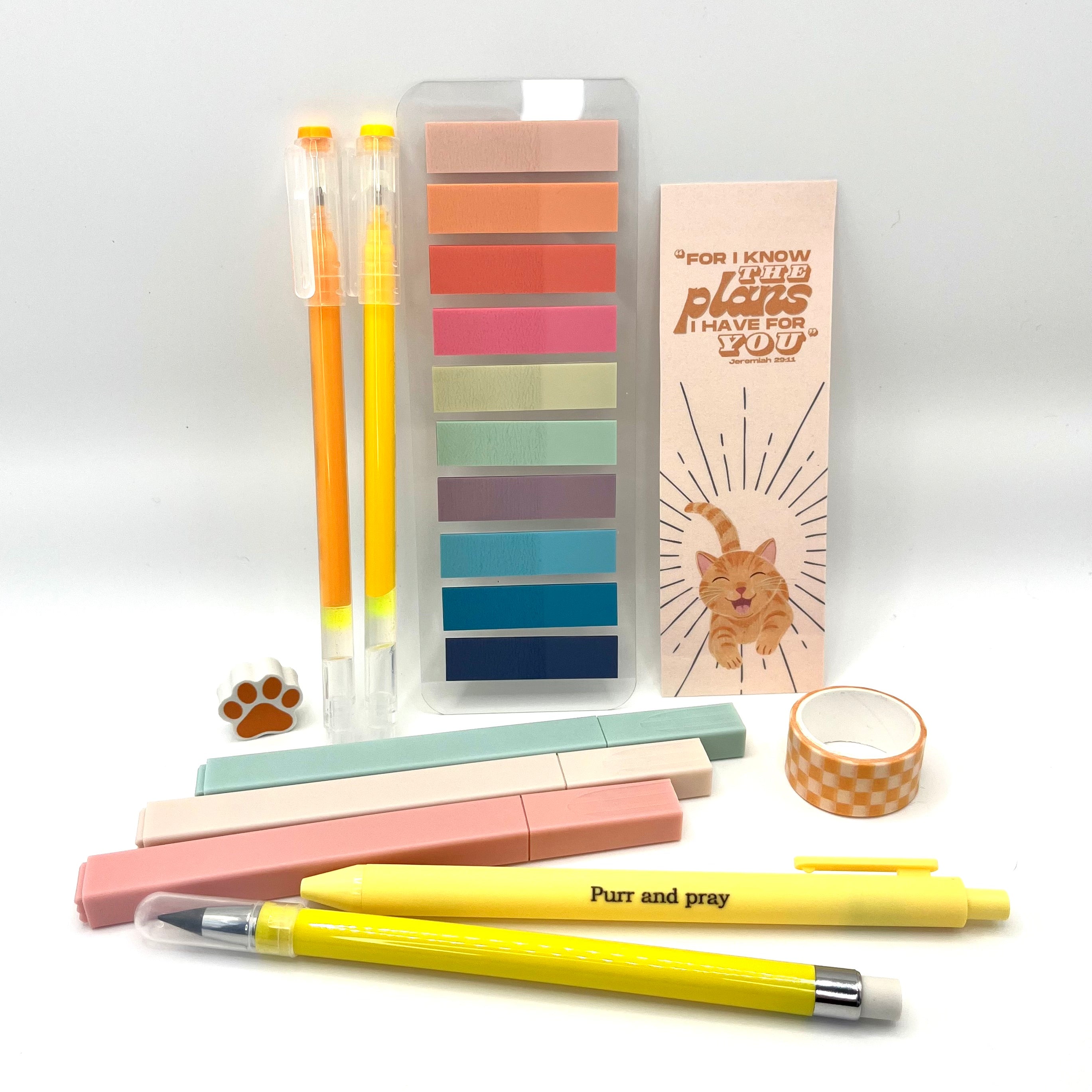 Christian stationery set including highlighters, gel pens, everlasting pencil, sticky notes, washi tape, bookmark, and eraser arranged neatly in orange color palette.