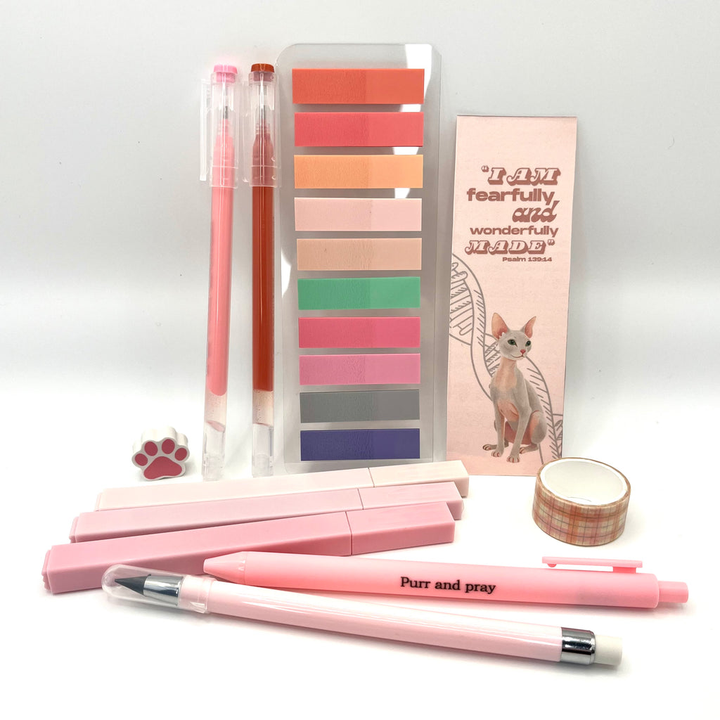 Christian stationery set including highlighters, gel pens, everlasting pencil, sticky notes, washi tape, bookmark, and eraser arranged neatly in light pink color palette.