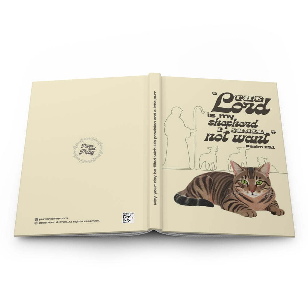 Open book with a brown tabby cat illustration and motivational text on a white background.
