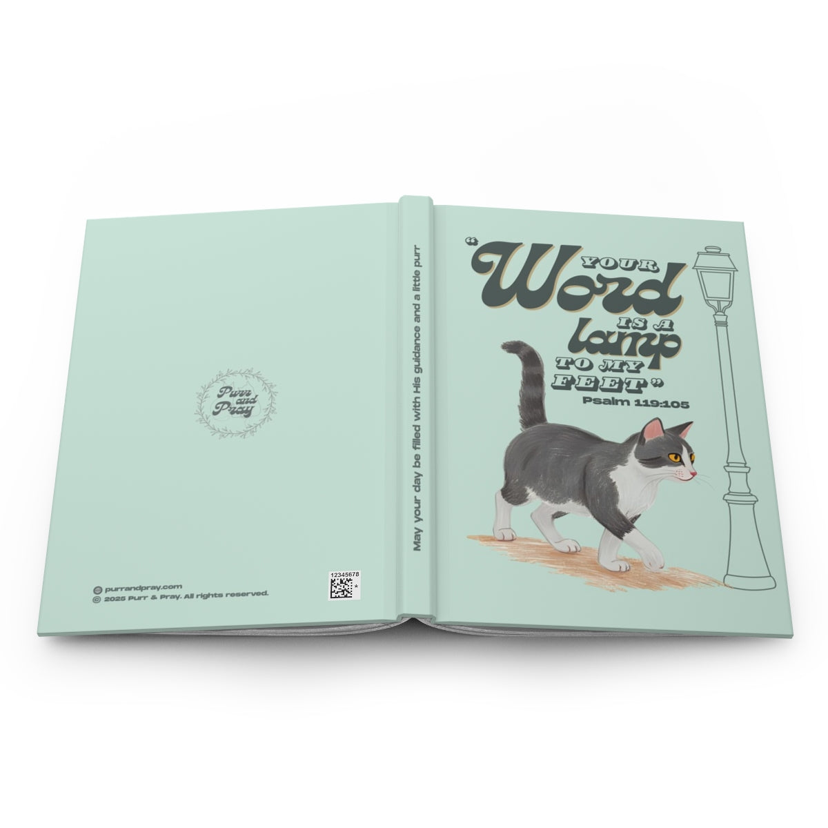 Open book with a gray tuxedo cat illustration and motivational text on a white background.