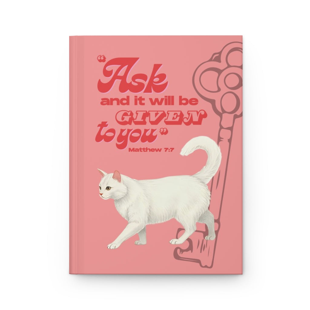 Front cover of A5 Christian journal featuring the Bible verse ‘Ask and it will be given to you’ with a white cat illustration.