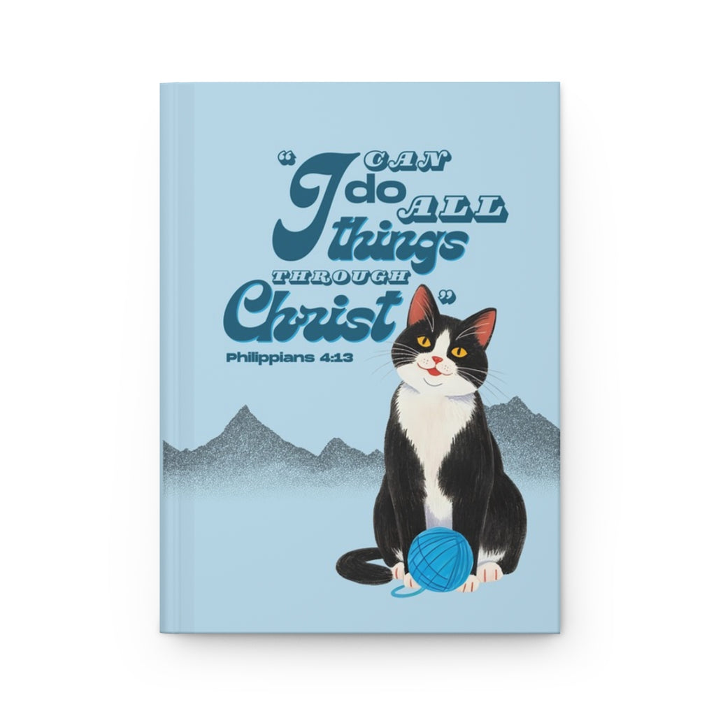 Front cover of A5 Christian journal featuring the Bible verse ‘I can do all things through Christ’ with a tuxedo cat illustration.