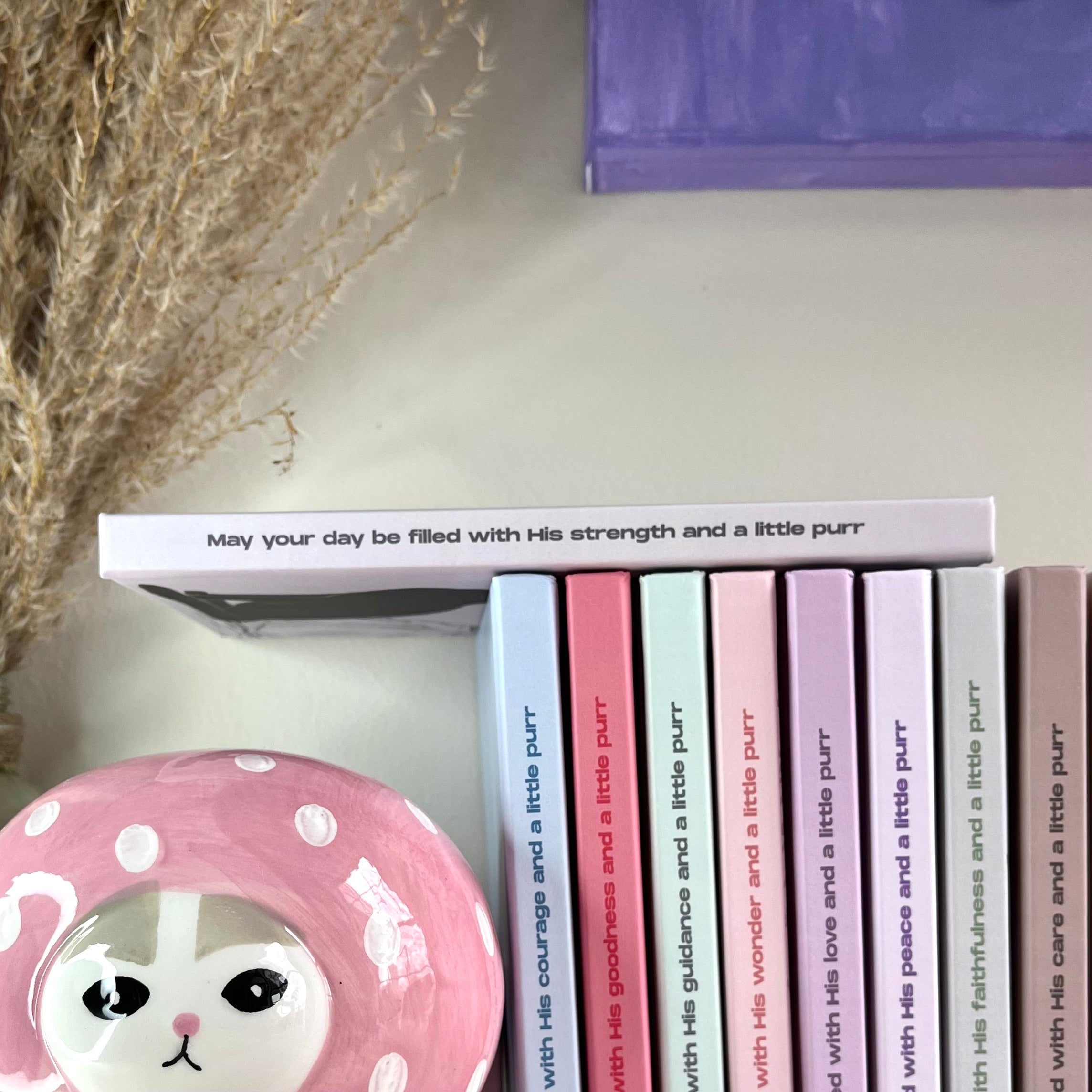 A side of a notebook with christian text on it