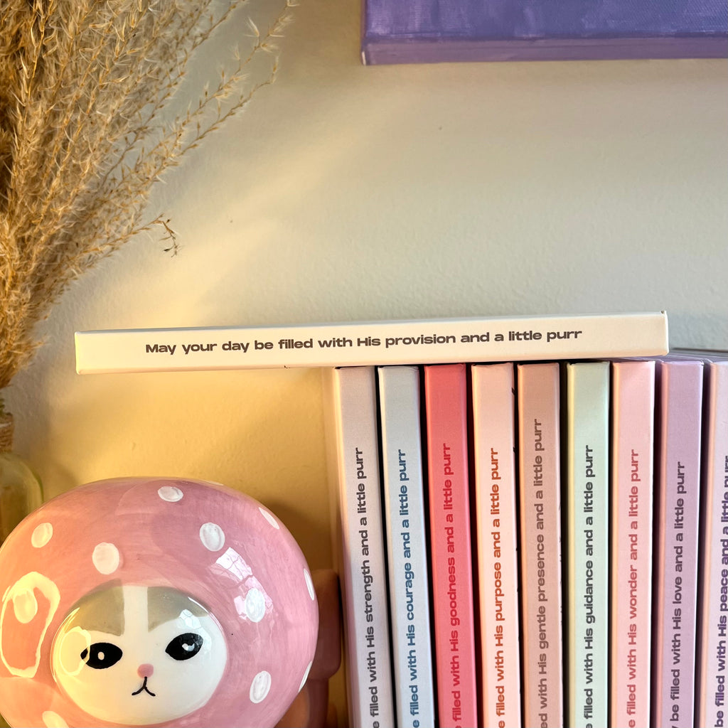 A side of notebook with Christian text on it.