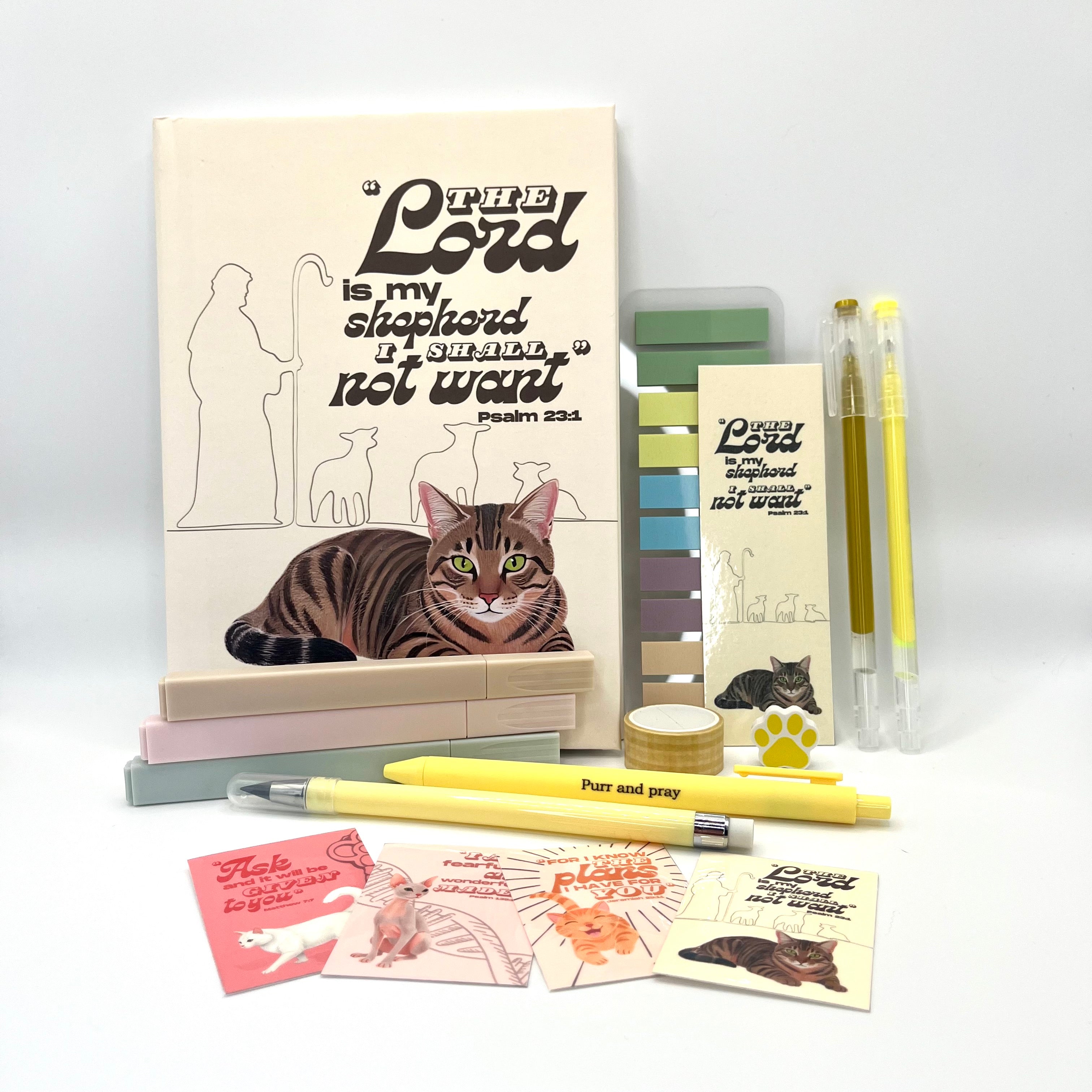Christian journal gift set with Bible verse journal featuring a brown tabby cat illustration, coordinated stationery items, and Scripture stickers.
