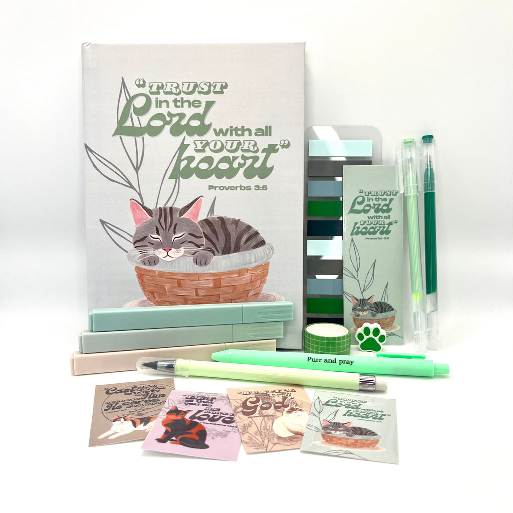 Christian journal gift set with Bible verse journal featuring a gray tabby illustration, coordinated stationery items, and Scripture stickers.