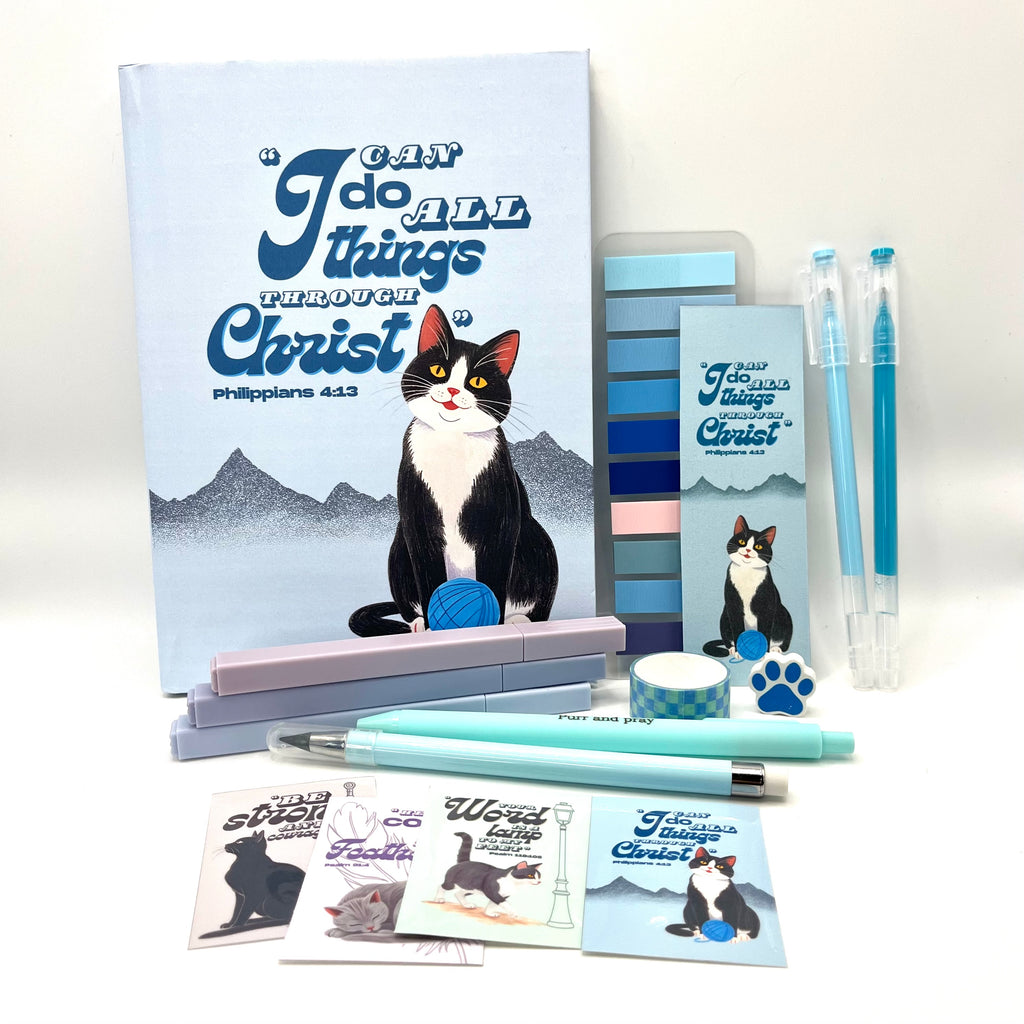 Christian journal gift set with Bible verse journal featuring a tuxedo cat illustration, coordinated stationery items, and Scripture stickers.