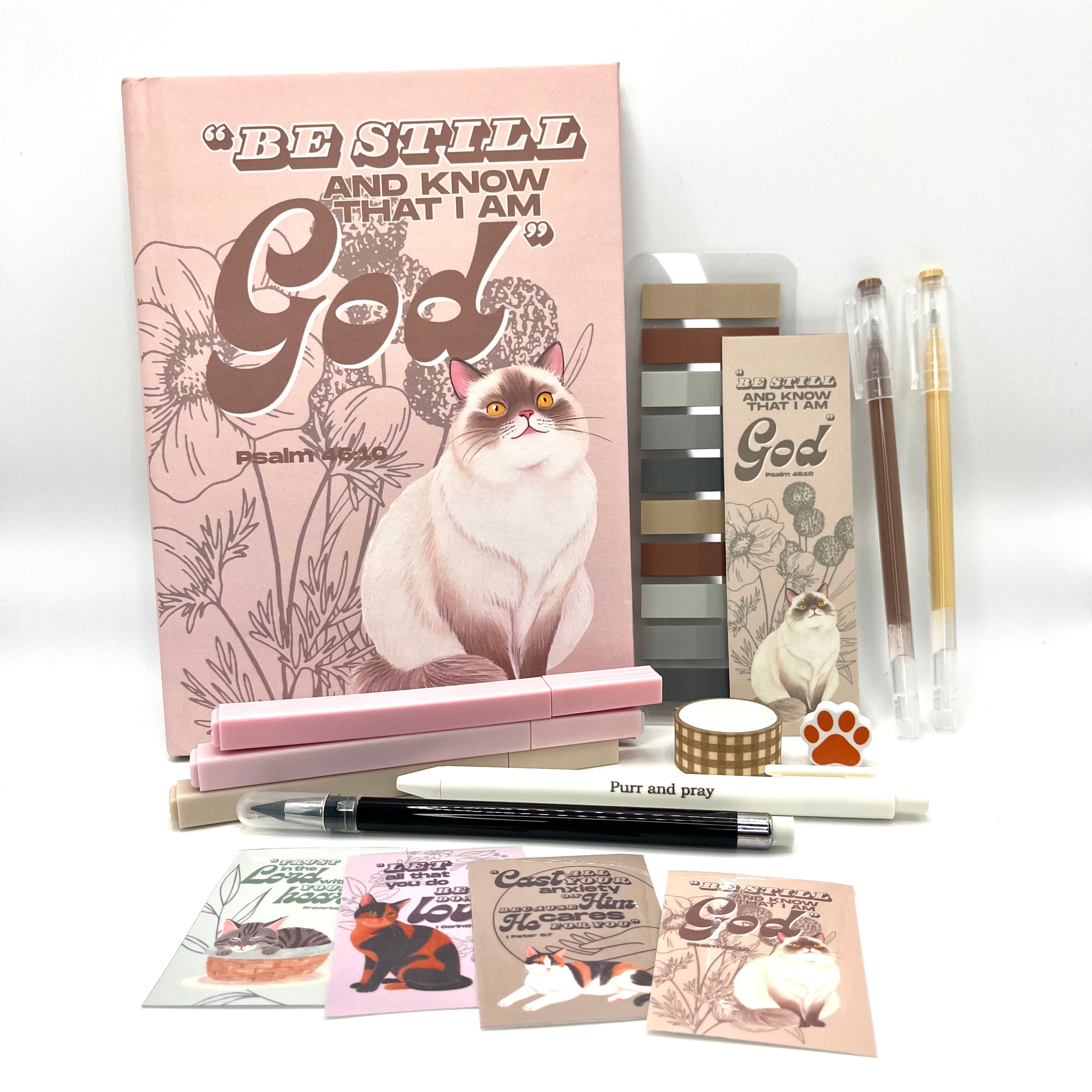 Christian journal gift set with Bible verse journal featuring a siamese cat illustration, coordinated stationery items, and Scripture stickers.