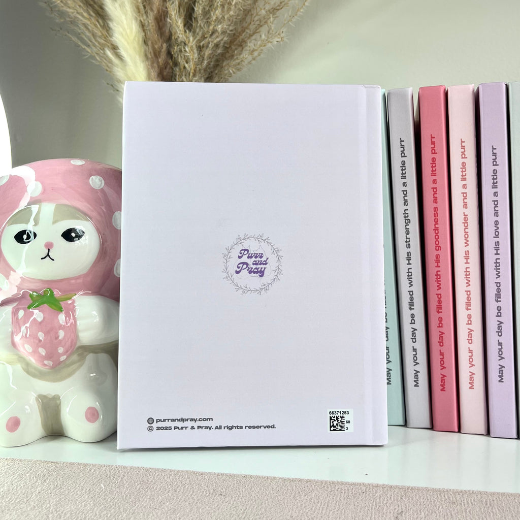 A back cover of a lavender color notebook.