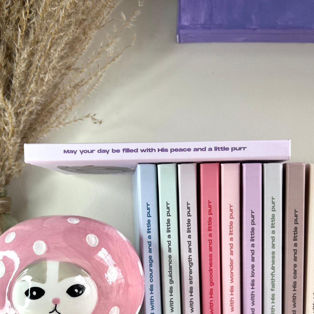 A side of a notebook with Christian text on it.