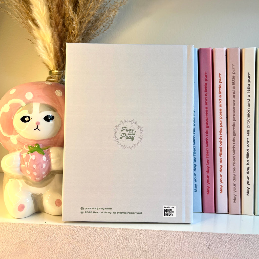 A back of a green notebook.