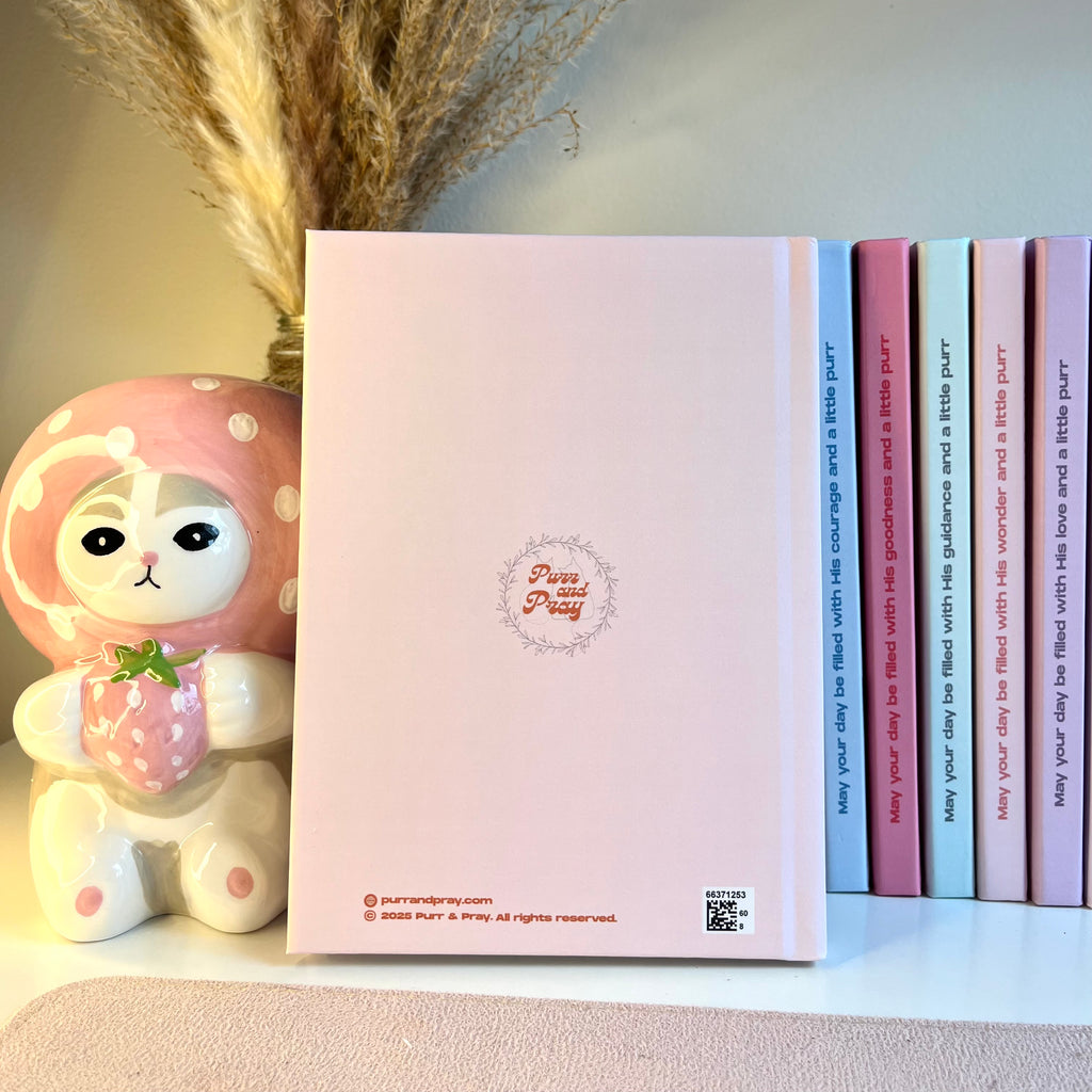 A back of an orange notebook.