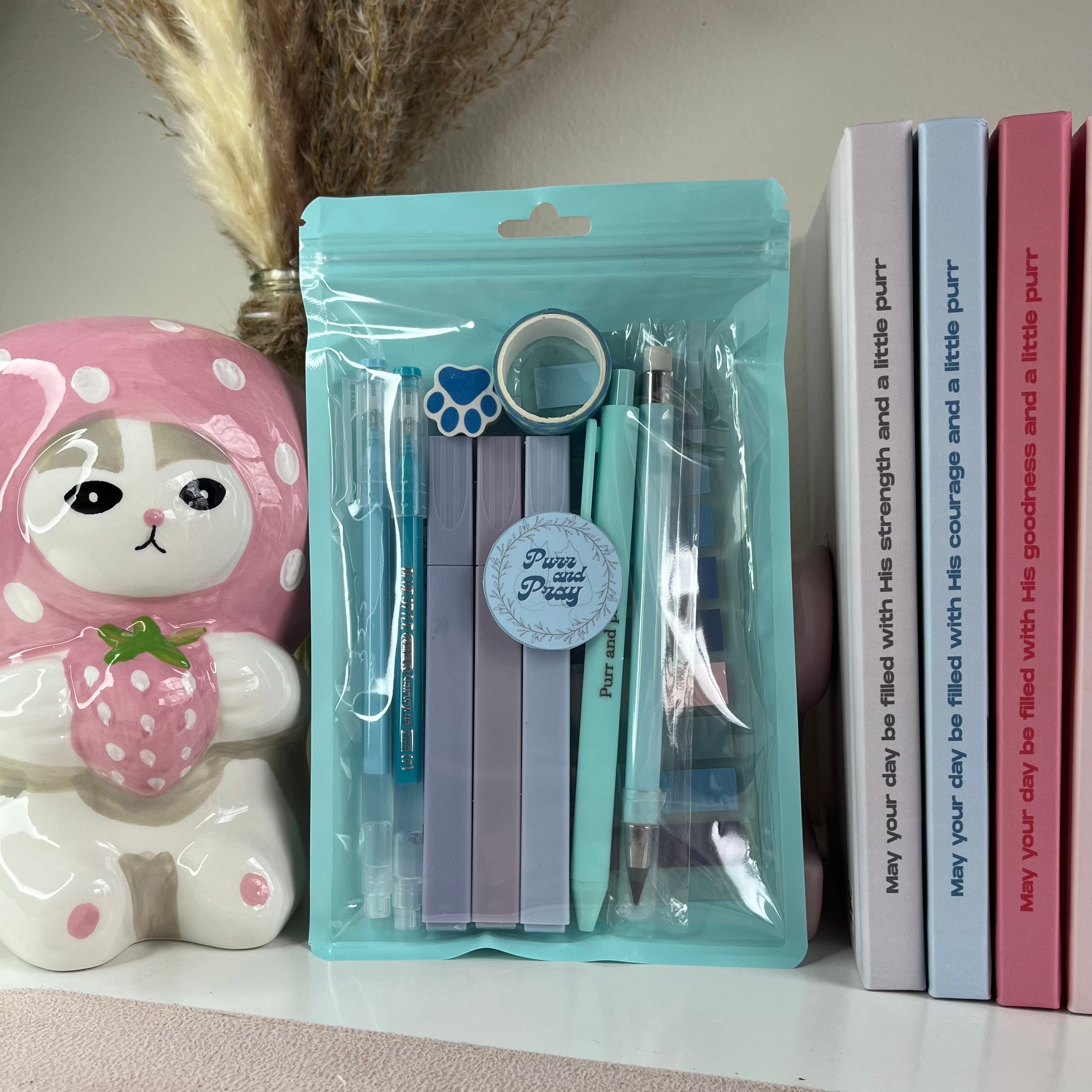 Packaged tuxedo cat themed blue stationery set.